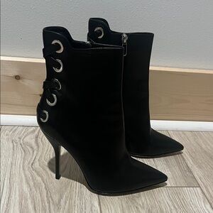 Paul Andrew’s Black Stiletto Ankle Boots with Grommet Detail